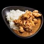 Japanese Curry with steamed rice and karaage in sesame seeds